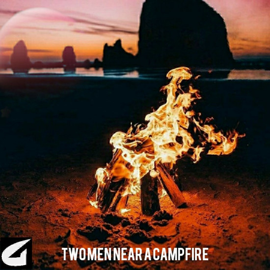 Two men near a campfire